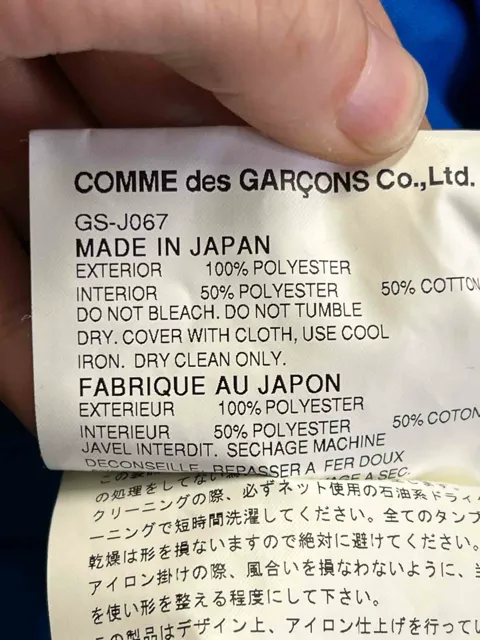 Size M |  Comme des Garçons Asymmetrical Jacket
